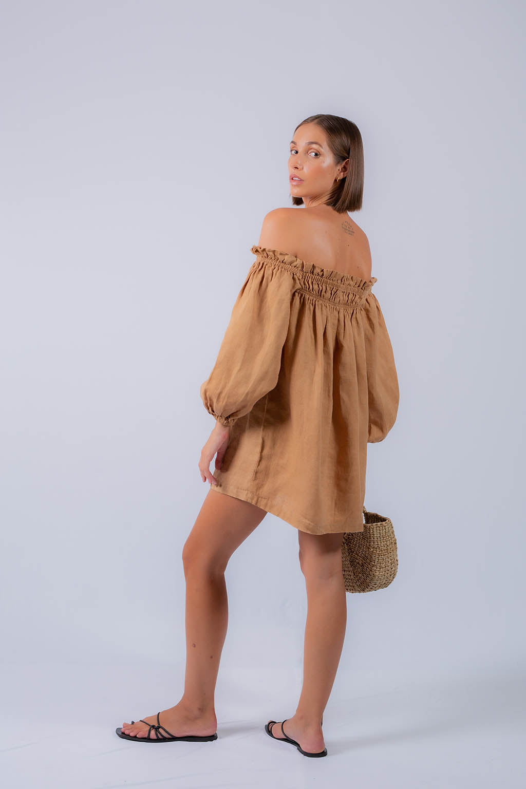 tan off shoulder dress ASOS DESIGN Curve off-shoulder pleated waist detail midi pencil dress in apricot